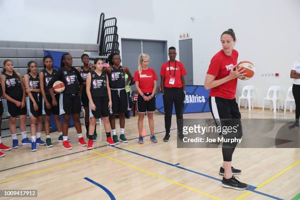 Legend Ruth Riley goes over drills with the campers at the Basketball Without Boarders Africa program at the American International School of...