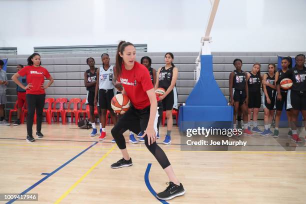 Legend Ruth Riley goes over drills with the campers at the Basketball Without Boarders Africa program at the American International School of...