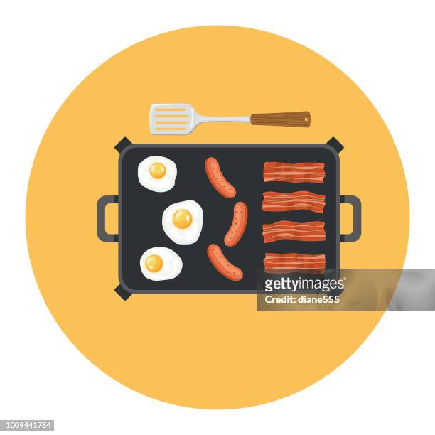cute breakfast food icon - electric griddle with bacon eggs and sausage cooking - griddle stock illustrations