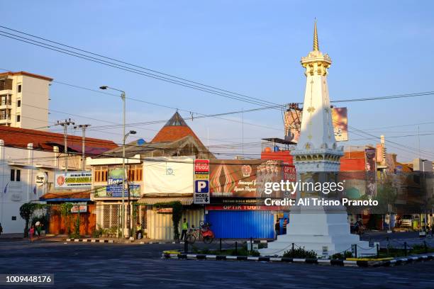tugu yogyakarta city or yogyakarta monument, in early morning. - jogjakarta city stock pictures, royalty-free photos & images