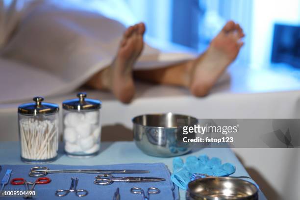 corpse in morgue. focus on toe tag. - morgue feet stock pictures, royalty-free photos & images