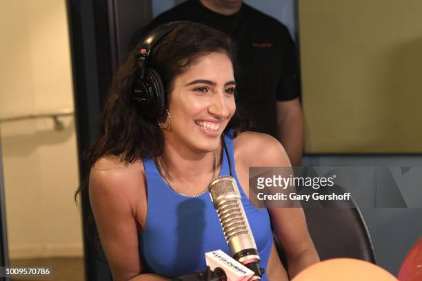 Singer Abir of the music group Cash Cash visits "The Elvis Duran Z100 Morning Show" at Z100 Studio on August 2, 2018 in New York City.