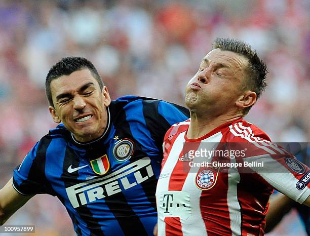 Lucio of Inter Milan and Ivica Olic of FC Bayern Muenchen in action during the UEFA Champions League Final match between FC Bayern Muenchen and Inter...