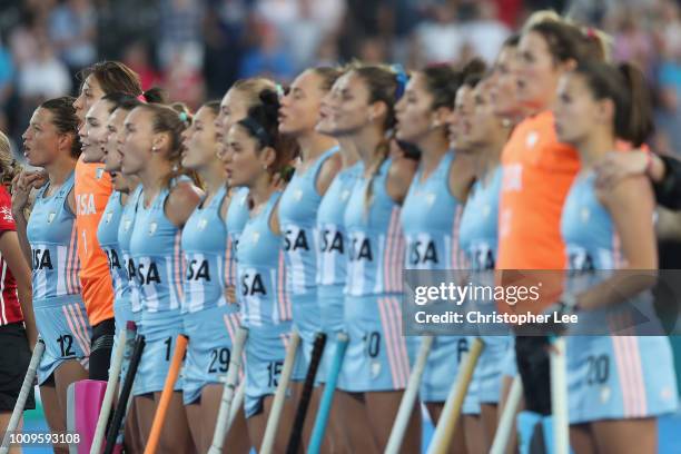 The Argentina team sing their national anthem during the Quarter Final game between Australia and Argentina of the FIH Womens Hockey World Cup at Lee...