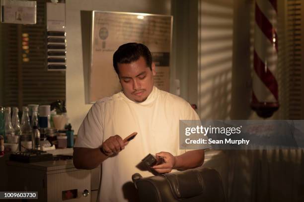 barber cleaning his tools