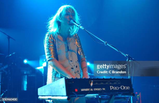 Emily Haines of Metric performs on stage at Shepherds Bush Empire on May 24, 2010 in London, England. She plays a Sequential Circuits Pro-One...