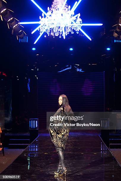 Naomi Campbell walks the runway at the NEON Charity Gala in aid of the IRIS Foundation on May 24, 2010 in Moscow, Russia.