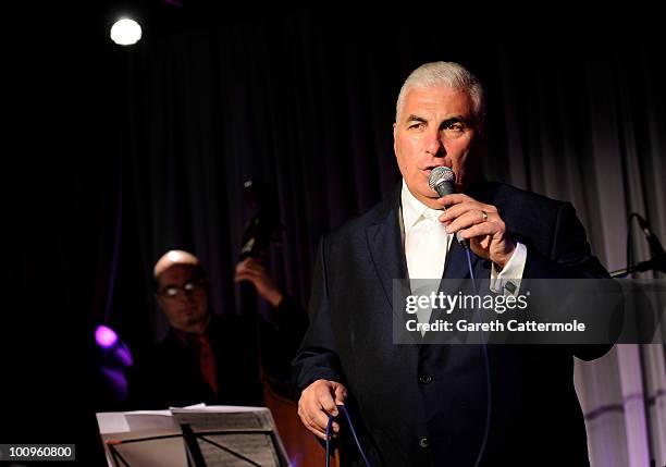 Mitch Winehouse performs during the launch of his new album 'Rush Of Love' at Pizza On The Park on May 26, 2010 in London, England.