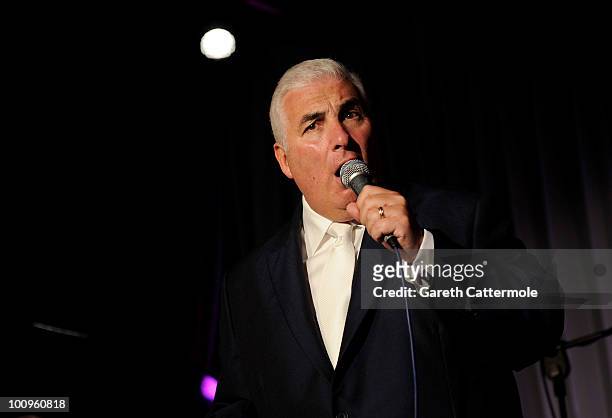 Mitch Winehouse performs during the launch of his new album 'Rush Of Love' at Pizza On The Park on May 26, 2010 in London, England.