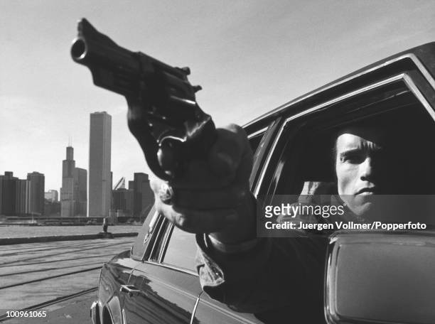 Actor Arnold Schwarzenegger films a scene for the film 'Raw Deal' in Chicago, 1986.