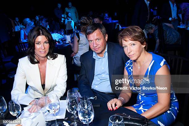 Olga Slitsker, Valentin Yumashev and Tatiana Yumasheva attend the NEON Charity Gala in aid of the IRIS Foundation on May 24, 2010 in Moscow, Russia.