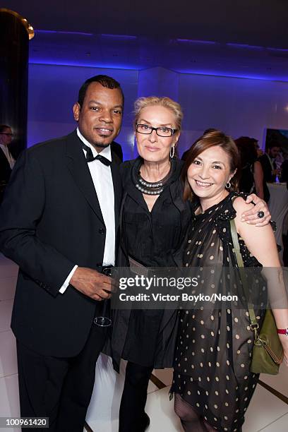 John Mann and Olga Sviblova and Irina Mann attend the NEON Charity Gala in aid of the IRIS Foundation on May 24, 2010 in Moscow, Russia.