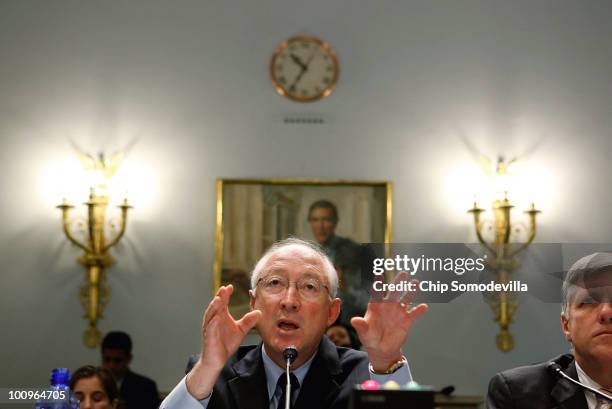 Interior Secretary Ken Salazar testifies before the House Committee on Natural Resources with Interior Deputy Secretary David Hayes during a hearing...