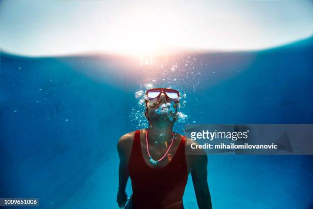 woman snorkeling - free diving stock pictures, royalty-free photos & images