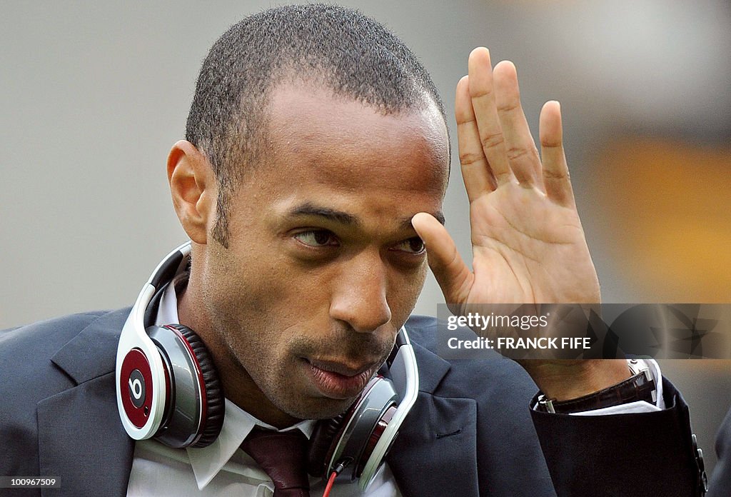 French captain Thierry Henry gestures be