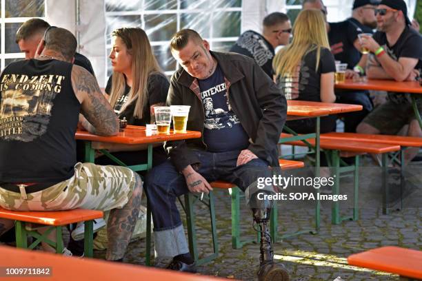 Handicapped Neo-Nazis supporter seen at the German musical festival. Anti-fascists held a counter-rally against neo-Nazi supporters who arrived for a...