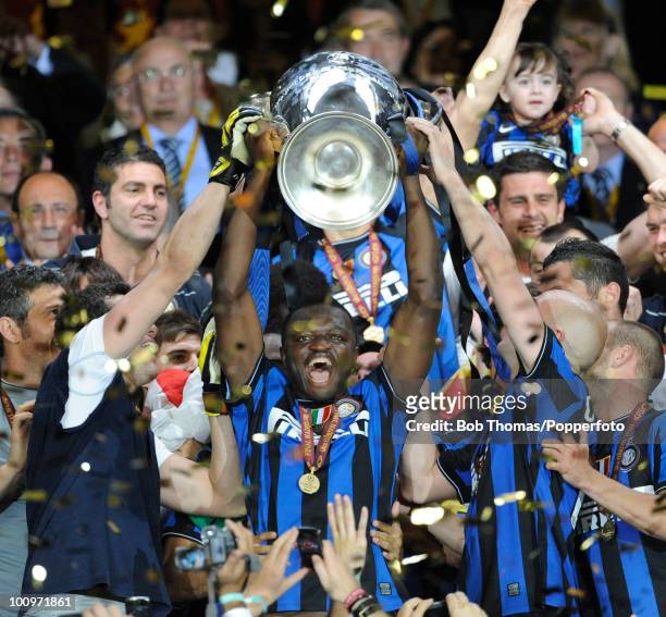 Sulley Muntari of Inter Milan celebrates with the trophy after winning the UEFA Champions League Final match between Bayern Munich and Inter Milan at...