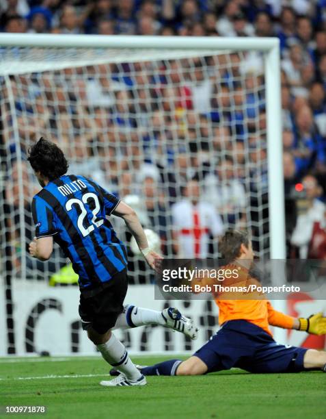 Diego Milito of Inter Milan scores the second of his two goals during the UEFA Champions League Final match between Bayern Munich and Inter Milan at...