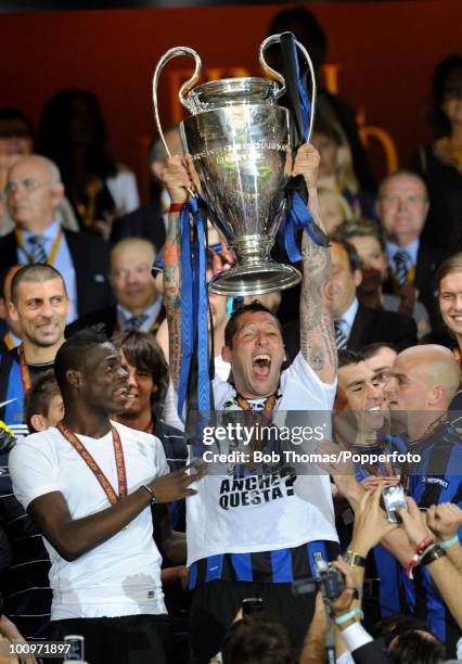 Marco Materazzi of Inter Milan celebrates with the trophy after winning the UEFA Champions League Final match between Bayern Munich and Inter Milan...