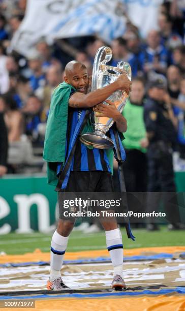 Maicon of Inter Milan celebrates with the trophy following the UEFA Champions League Final match between Bayern Munich and Inter Milan at the Estadio...
