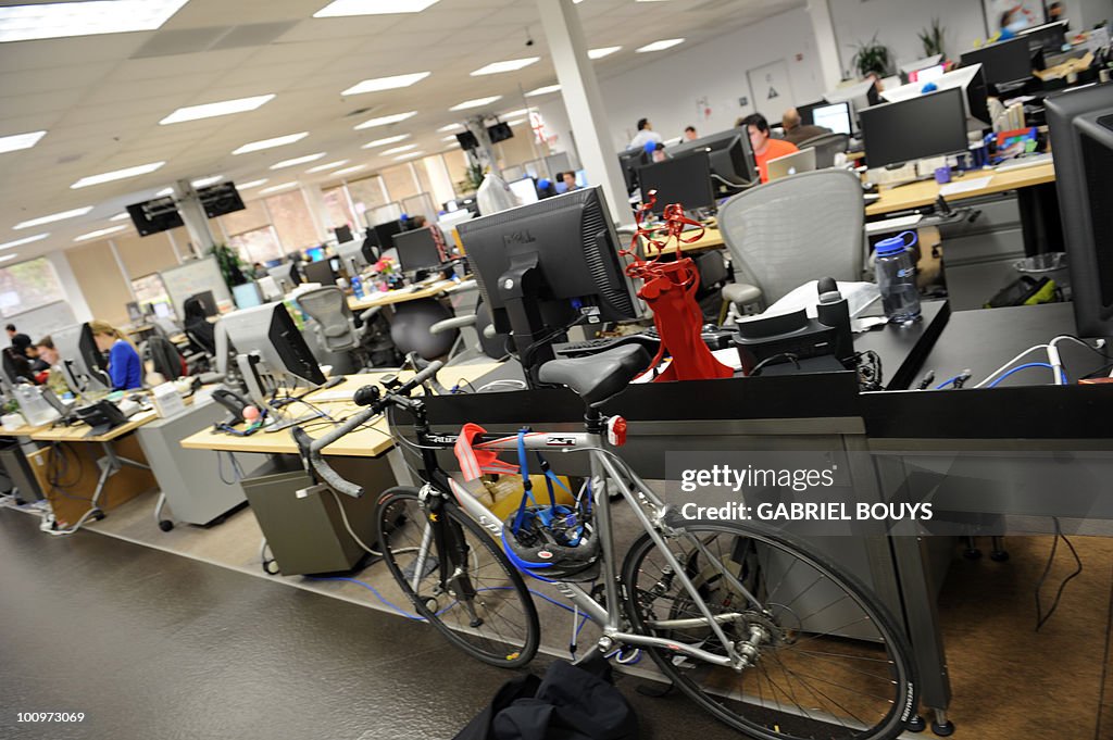 Employees work at the Facebook headquate