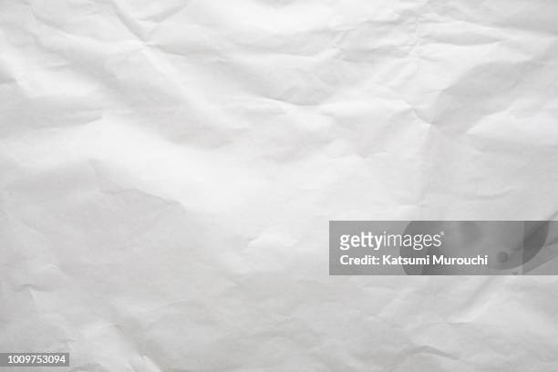 white wrinkled paper texture background - wrinkled paper stock pictures, royalty-free photos & images