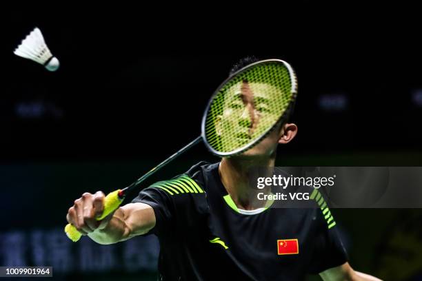 Chen Long of China competes in the Men's Singles first round match against Hsu Jen Hao of Chinese Taipei on day one of TOTAL BWF World Championships...