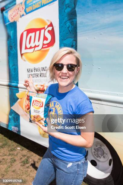 Television host and online personality Hannah Hart celebrates the New England Lobster Roll flavor at the Maine Lobster Festival to continue its Lay's...