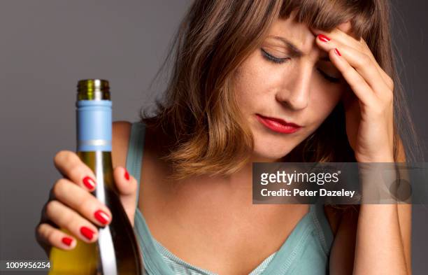 woman with hangover and depression - binge drinking fotografías e imágenes de stock