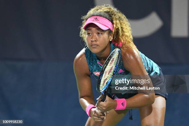 Naomi Osaka of Japan in position during a match against to Magda Linette of Poland during Day Six of the Citi Open at the Rock Creek Tennis Center on...