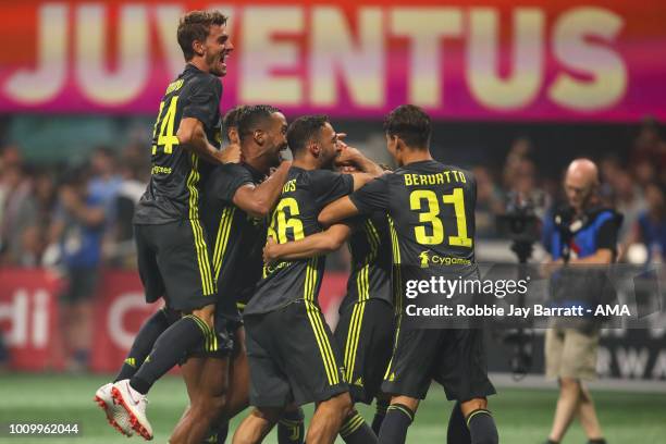 Players of Juventus celebrate winning the penalty shoot out after Mattia De Sciglio of Juventus scores the winning penalty during the 2018 MLS...