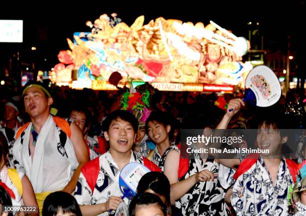 People march on with 'Nebuta' floats as the Aomori Nebuta Festival begins on August 2, 2018 in Aomori, Japan.