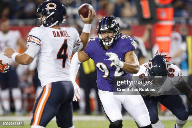 Bronson Kaufusi of the Baltimore Ravens rushes against Chase Daniel of the Chicago Bears in the first quarter of the Hall of Fame Game at Tom Benson...