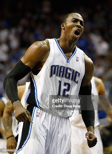 Dwight Howard of the Orlando Magic reacts in the third quarter against the Boston Celtics in Game Five of the Eastern Conference Finals during the...