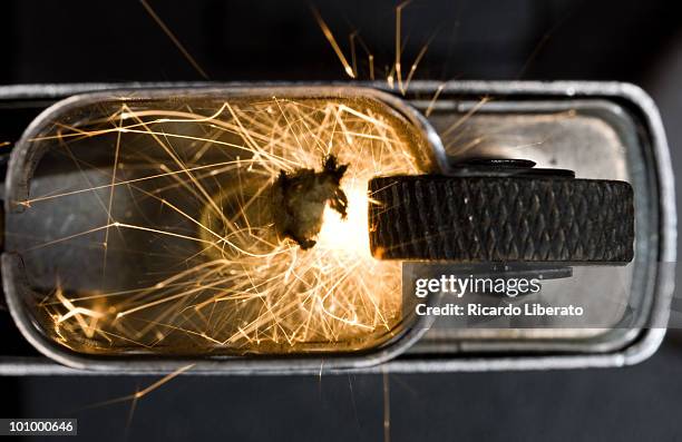 zippo lighter  - lighter spark stock pictures, royalty-free photos & images