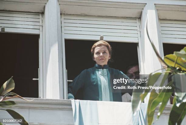 Wife of former President of Argentina Juan Peron, Isabel Martinez de Peron gazes at supporters from a balcony at a house in Vicente Lopez, Buenos...