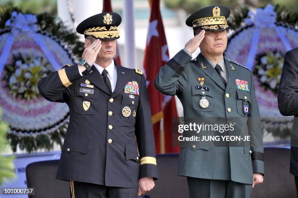General Walter Sharp , commander of the US Forces Korea, and Hwang ...