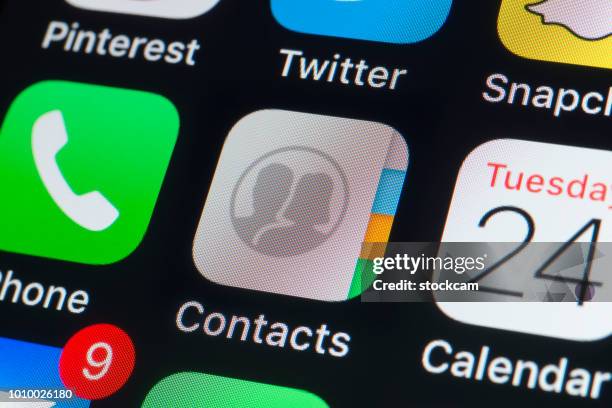 apple contacts, calendar,phone and other apps on iphone screen - eyeem stock pictures, royalty-free photos & images