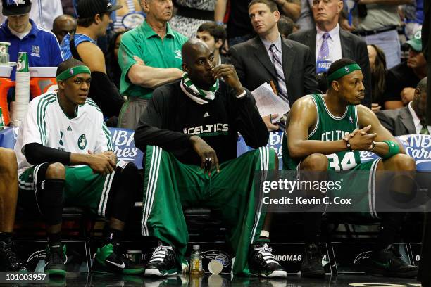 Rajon Rondo, Keivn Garnett and Paul Pierce of the Boston Celtics look on dejected from the bench in the final minutes of their 113-92 loss to the...