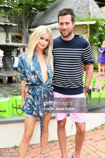 Natalie Obradovich and guest attend Harper's BAZAAR X Sam Edelman Mid-Summer Hamptons Event on August 2, 2018 in Southampton, New York.