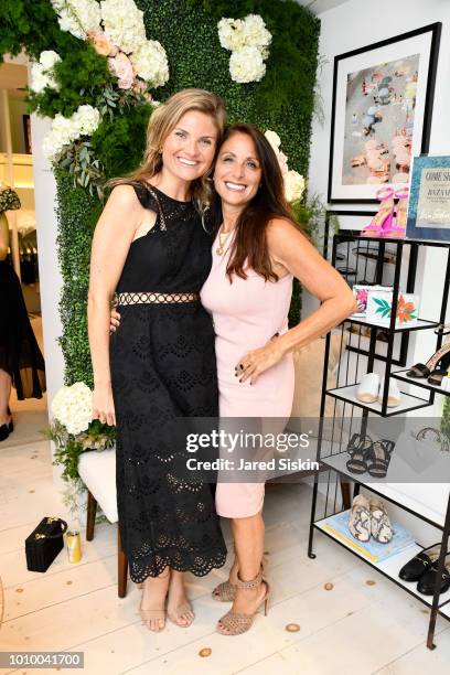 Lizzi Bickford and guest attend Harper's BAZAAR X Sam Edelman Mid-Summer Hamptons Event on August 2, 2018 in Southampton, New York.