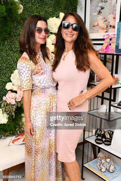 Candice Miller and guest attend Harper's BAZAAR X Sam Edelman Mid-Summer Hamptons Event on August 2, 2018 in Southampton, New York.