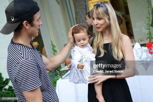 Steve Pieri and Kerry Pieri attend Harper's BAZAAR X Sam Edelman Mid-Summer Hamptons Event on August 2, 2018 in Southampton, New York.