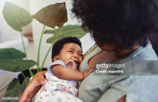 she hates nap time - crying sad african woman stock pictures, royalty-free photos & images