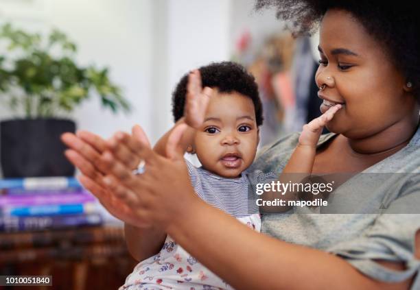 if you’re happy and you know it, clap your hands - black mother and baby stock pictures, royalty-free photos & images