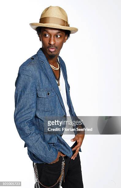 Singer K'NAAN poses backstage of 'The Dome 54' at the Schleyerhalle on May 20, 2010 in Stuttgart, Germany.