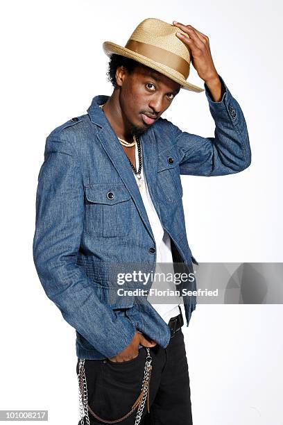 Singer K'NAAN poses backstage of 'The Dome 54' at the Schleyerhalle on May 20, 2010 in Stuttgart, Germany.