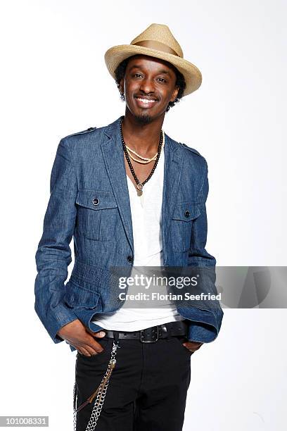 Singer K'NAAN poses backstage of 'The Dome 54' at the Schleyerhalle on May 20, 2010 in Stuttgart, Germany.