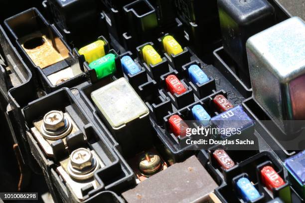 full frame of an electrical fuse and relay box in an automobile - breaker box stockfoto's en -beelden