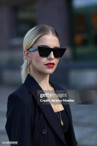 Caro Daur wearing a complete Marc Cain look during the Berlin Fashion Week July 2018 on July 3, 2018 in Berlin, Germany.